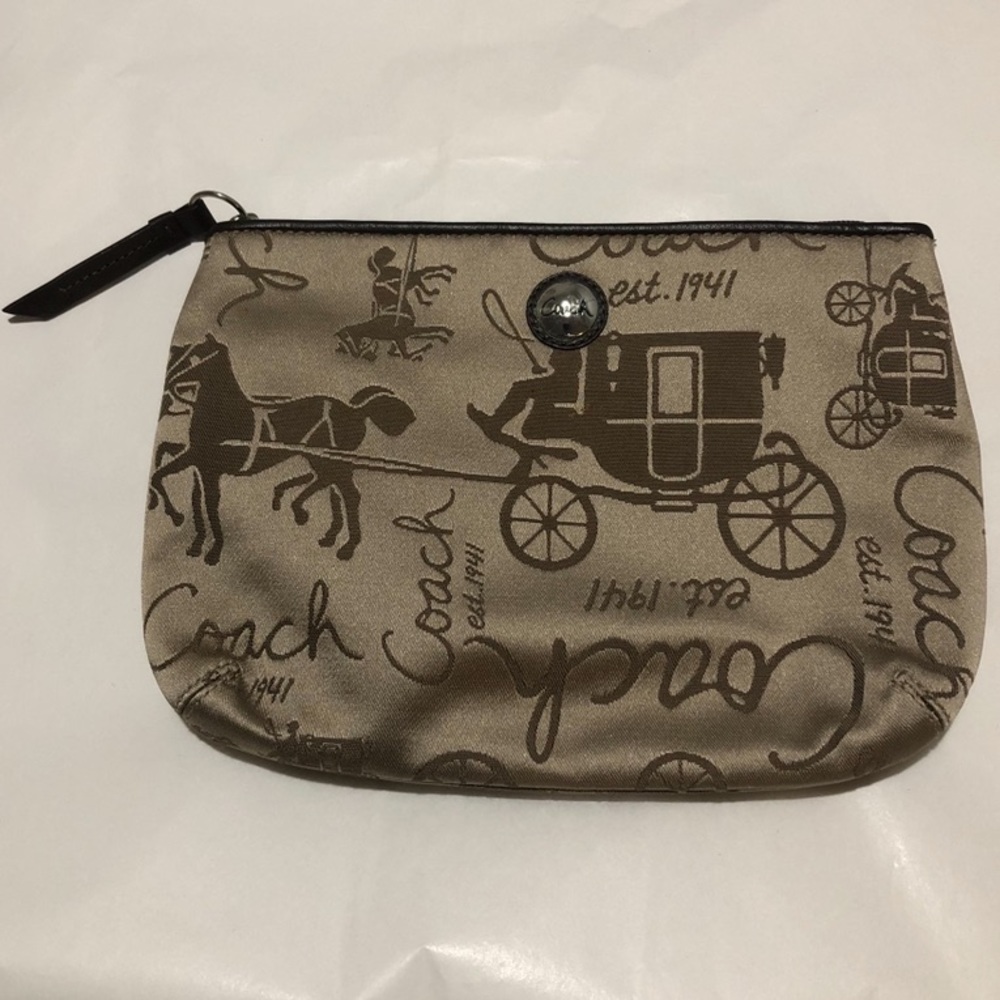 Coach embroidered wristlet NWT